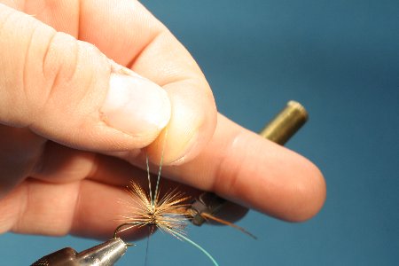 Schlaufe zusammenziehen